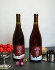 Bottle of Good Measure 2023 Oregon Grenache and 2022 Oregon Pinot Noir